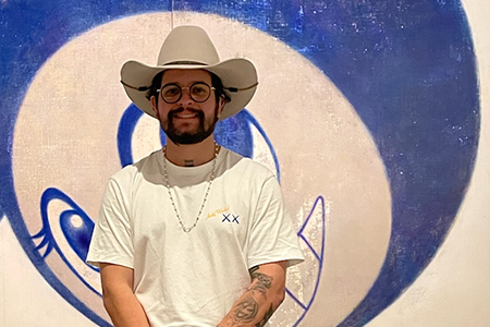 Martin Duarte Garcia wearing hat, standing in public space