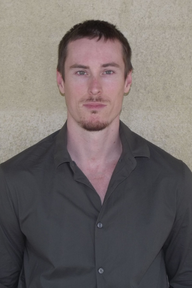 Alumnus Jack Clements wearing a shirt