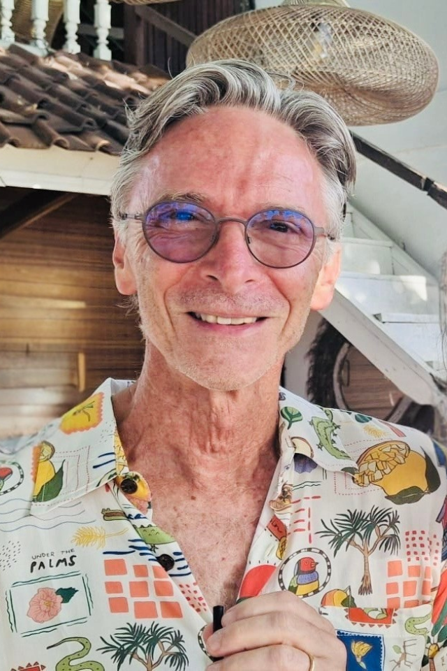 Alumnus John Callanan in a vibrant shirt