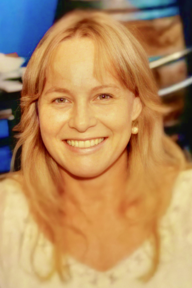 Alumna Sheryl J Cavanagh smiling at the camera