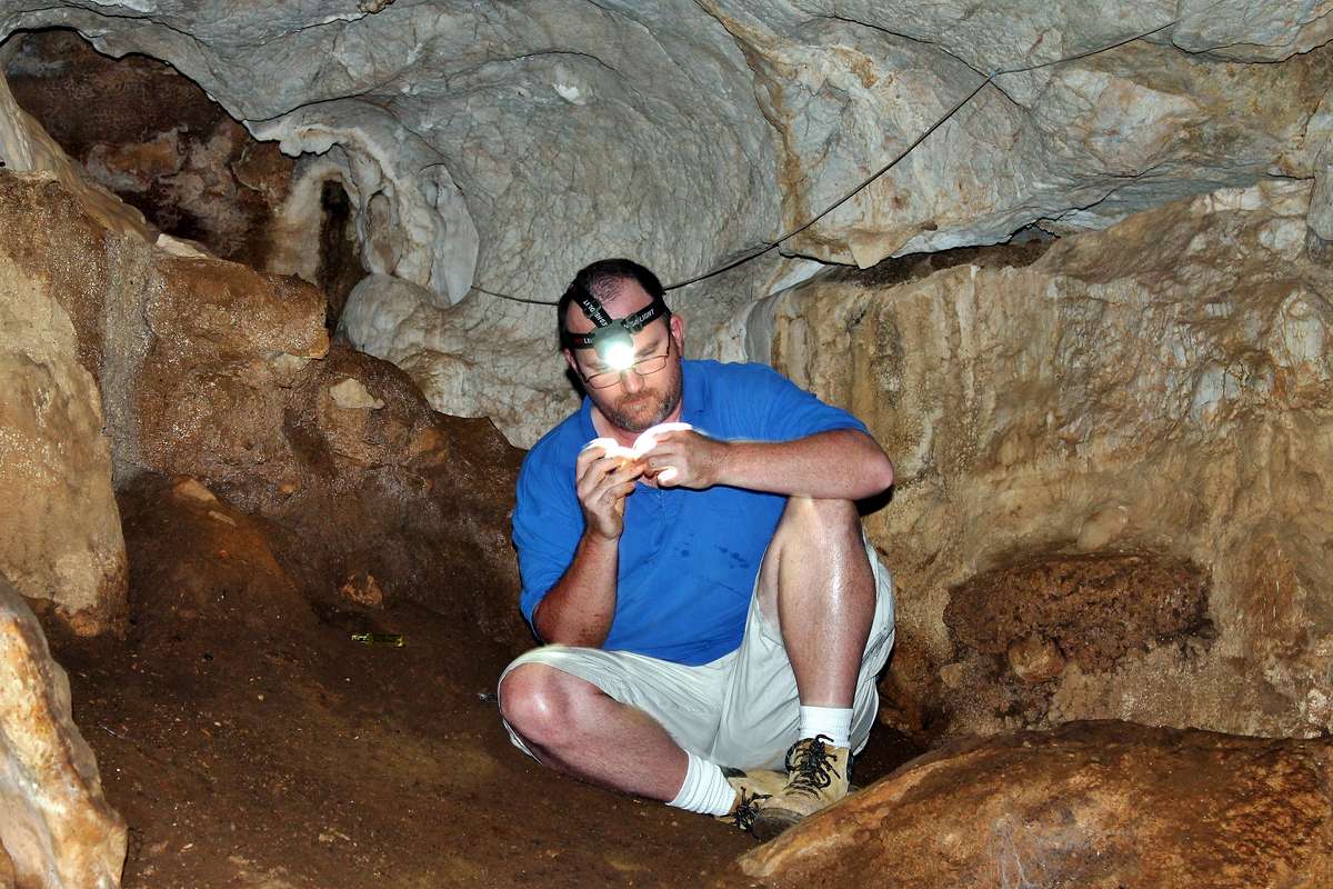 Dr Scott - Excavating fossils at Capricorn Caves (c) Rochelle Lawrence.JPG