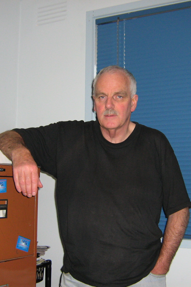 Alumnus William Kirk wearing a black tshirt
